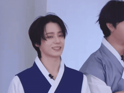 Man In Blue Vest Smiling GIF