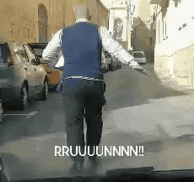 Man In Blue Vest Walking Saying Rruuuunnn GIF