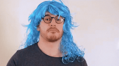 Man In Blue Wig Making Face GIF