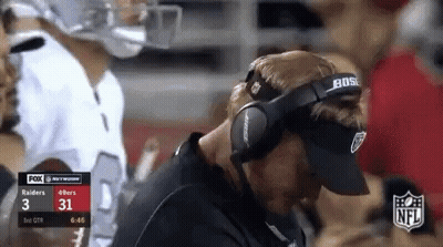 Man In Bose Headphones Watching Football GIF
