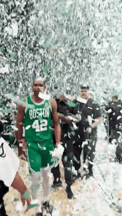 Man In Boston 42 Jersey Walking Through Crowd GIF