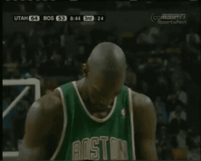 Man In Boston Jersey Holding Basketball GIF