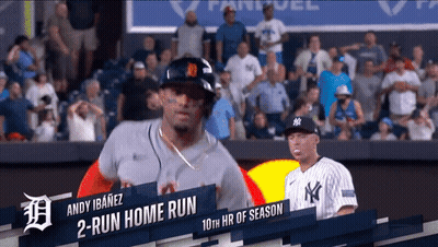 Man In Boston Jersey Waves To Another Man GIF