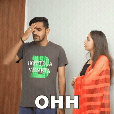 Man In Bottega Veneta T-Shirt Standing Next To Woman GIF