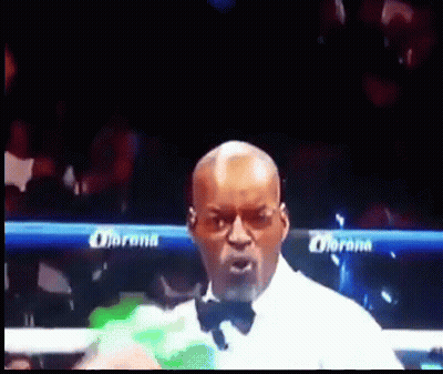 Man In Bow Tie Boxing Ring GIF