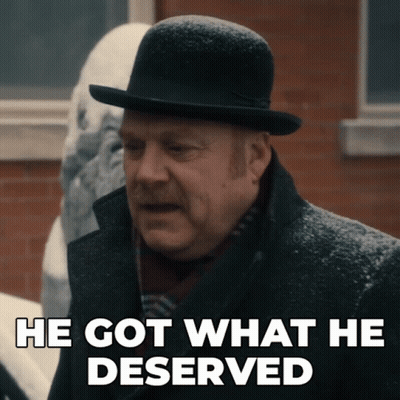 Man In Bowler Hat And Coat Says He Got What He Deserved GIF