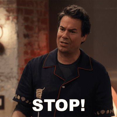 Man In Bowling Shirt Saying Stop GIF
