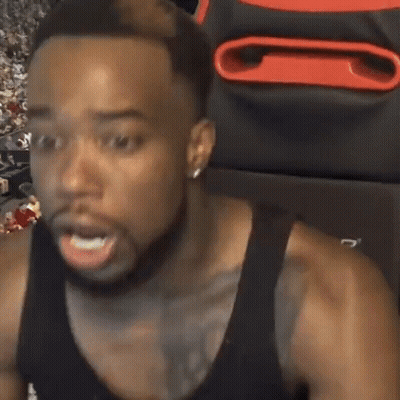 Man In Boxing Gloves In Dark Room GIF