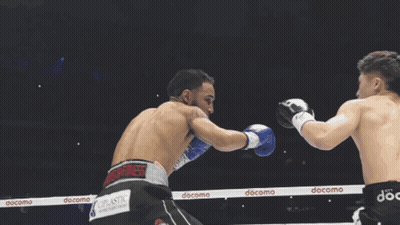 Man In Boxing Gloves Number 11 GIF
