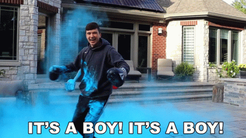 Man In Boxing Gloves With Blue Powder Saying It's A Boy GIF
