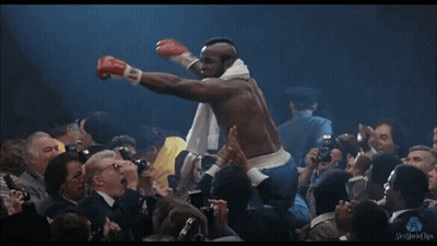 Man In Boxing Gloves With Slurber Towel GIF
