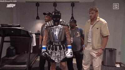 Man In Boxing Outfit With Paul GIF