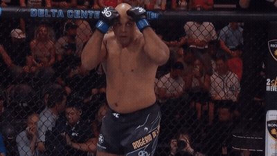 Man In Boxing Ring Before Delta Center Sign GIF
