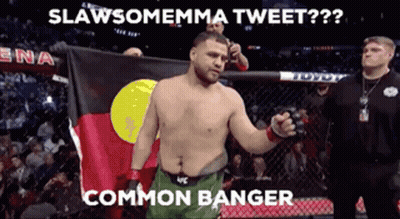 Man In Boxing Ring Holding Flag Saying Slawsoemma Tweet GIF