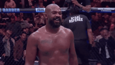 Man In Boxing Ring Wearing UFC Shirt GIF