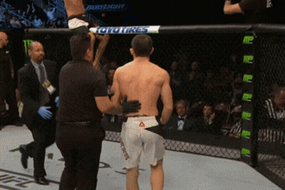 Man in Boxing Ring With Bud Light Banner
