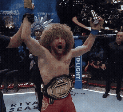 Man In Boxing Ring With Bud Light Sign GIF