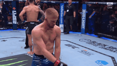 Man In Boxing Ring With Bud Light Sign GIF