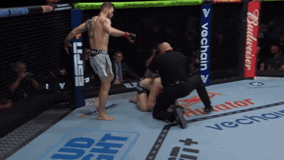 Man In Boxing Ring With Budweiser Ad GIF