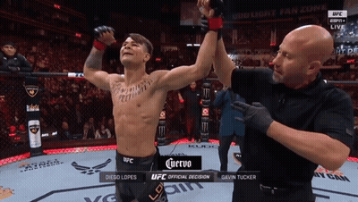 Man In Boxing Ring With Corona GIF