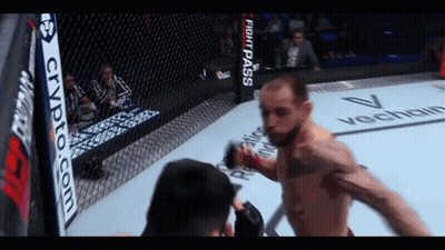Man In Boxing Ring With Crypto.com Sign GIF