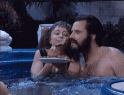 Man In Boxing Ring With Fatal Fury On Screen GIF
