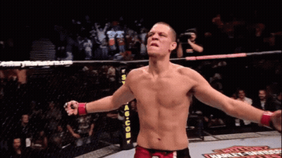 Man In Boxing Ring With Harley Davidson Sign GIF
