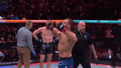 Man In Boxing Ring With Hypnotiq Sign GIF