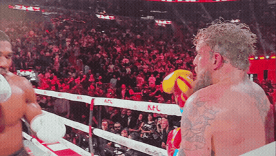 Man In Boxing Ring With KFC Banner GIF
