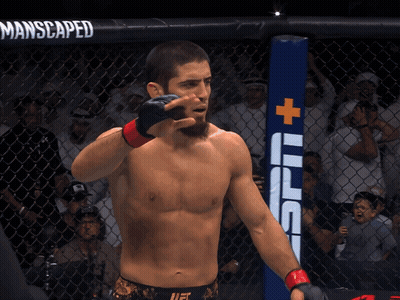 Man In Boxing Ring With Manscaped Sign GIF
