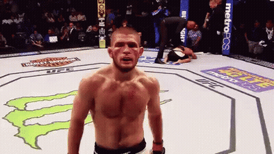 Man In Boxing Ring With Metropcs Banner GIF