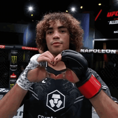 Man In Boxing Ring With Napoleon On Wall GIF