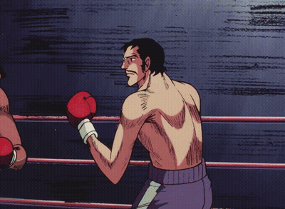 Man In Boxing Ring With Red Gloves GIF