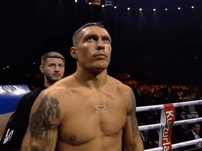 Man In Boxing Ring With Red Kuzurla Ribbon GIF
