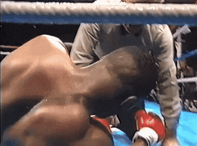 Man In Boxing Ring With Referee GIF