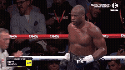 Man In Boxing Ring With Ribbons GIF