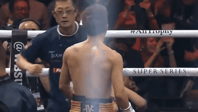 Man In Boxing Ring With Super Series Sign GIF