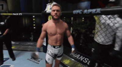 Man In Boxing Ring With UFC Apex Sign GIF