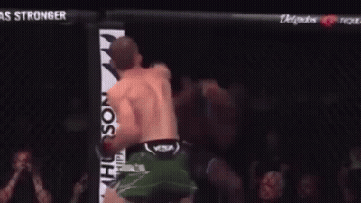 Man In Boxing Ring With UFC Fight Pass Sign GIF
