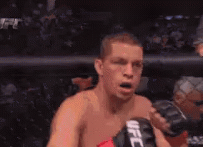 Man In Boxing Ring With UFC Glove GIF