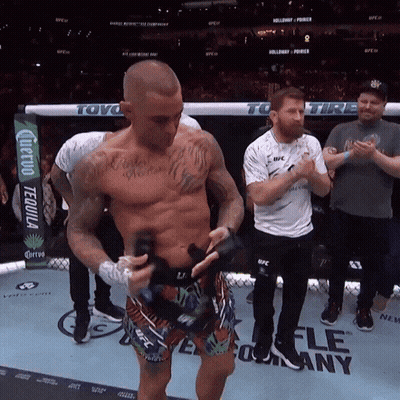 Man In Boxing Ring With UFC Sign GIF