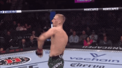 Man In Boxing Ring With Vochain Logo GIF