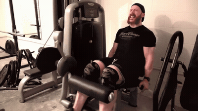 Man In Brave Champions Shirt Sitting In Gym GIF