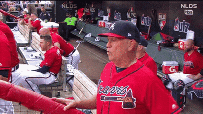 Man In Braves Jersey In Dugout GIF