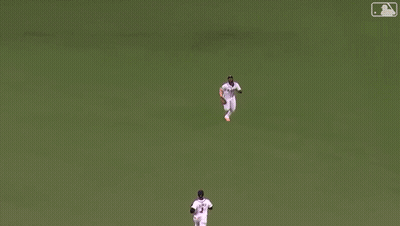 Man In Braves Jersey Stretching GIF