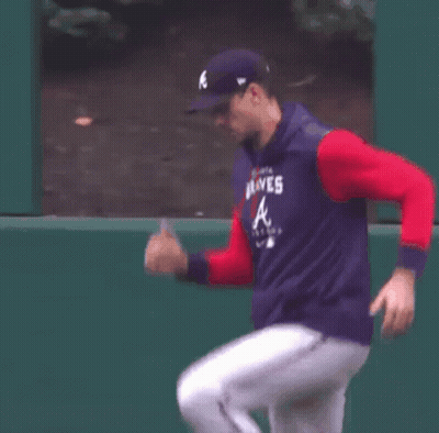 Man In Braves Shirt Dancing On Field GIF