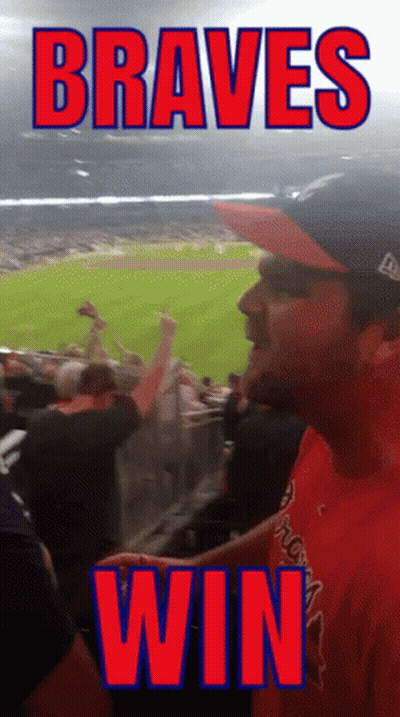 Man In Braves Shirt In Crowd GIF