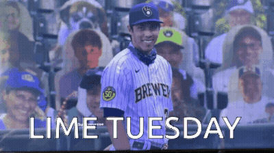 Man in Brewers Jersey in Front of Crowd