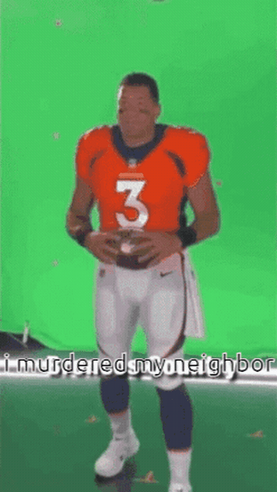 Man In Broncos Jersey Holding Football GIF