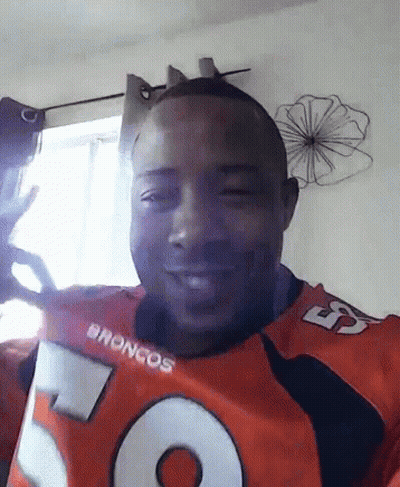 Man In Broncos Jersey Smiling GIF